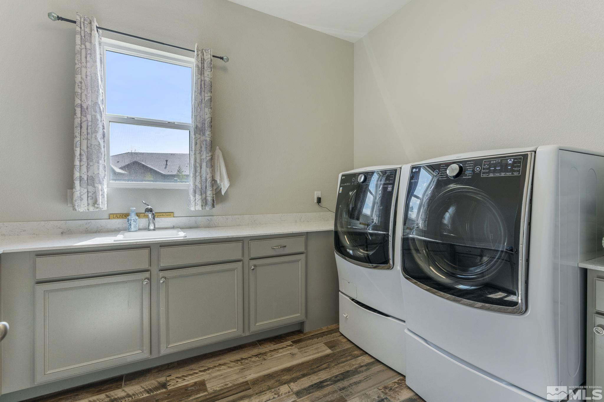 2305 Buttermere Drive Reno, NV 89521 - Photo 30 of 39 a utility room with sink and washing machine