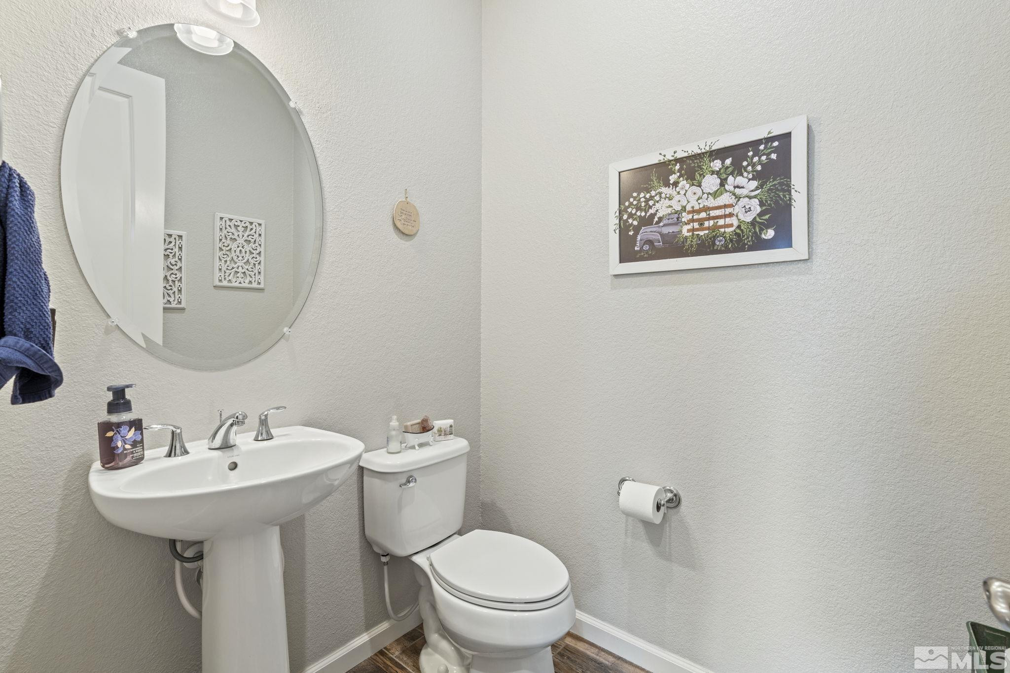2305 Buttermere Drive Reno, NV 89521 - Photo 31 of 39 a bathroom with a toilet sink and mirror