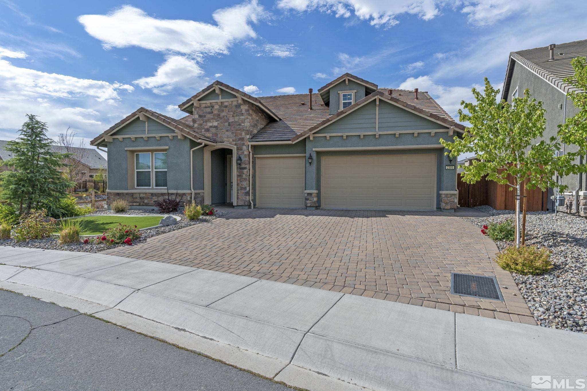 2305 Buttermere Drive Reno, NV 89521 - Photo 38 of 39 front view of a house with a yard