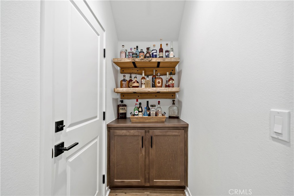 32230 Penstemon Way Temecula, CA 92591 - Photo 22 of 61 Built in cabinetry from garage access (barnwood shelves will not convey)