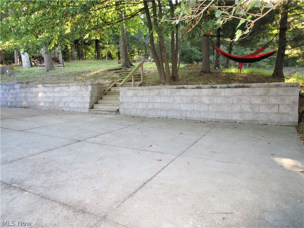 7482 Ridge Road Cleveland, OH 44129 - Photo 9 of 20 Newer retaining wall.