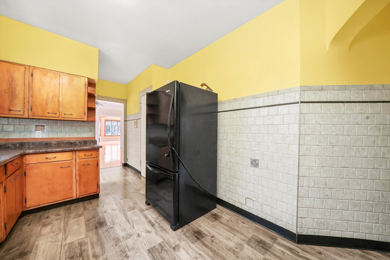 7825 South Phillips Avenue Chicago, IL 60649 - Photo 24 of 55 a kitchen with stainless steel appliances granite countertop a refrigerator and a stove