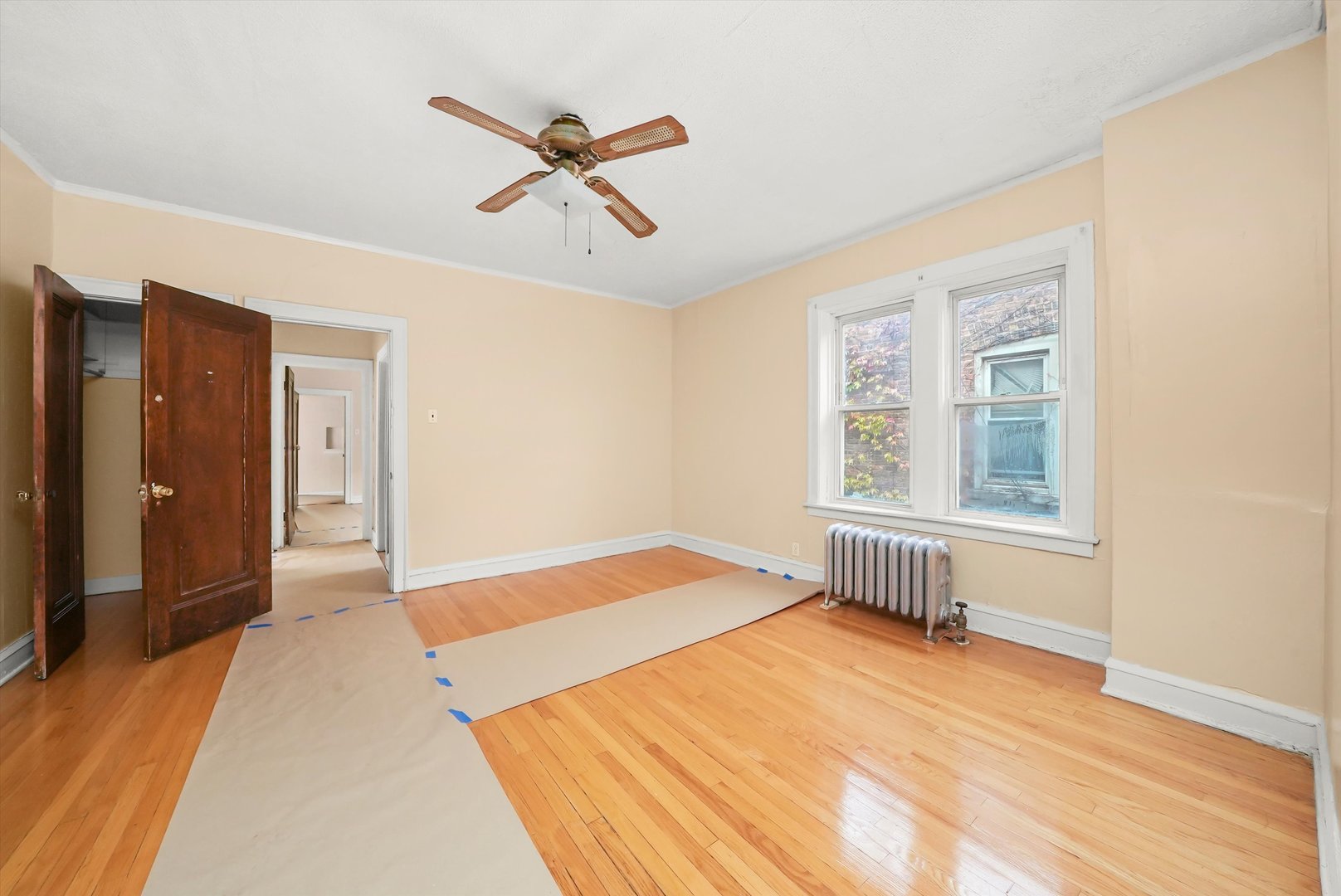 7825 South Phillips Avenue Chicago, IL 60649 - Photo 40 of 55 a bedroom with a bed and a window