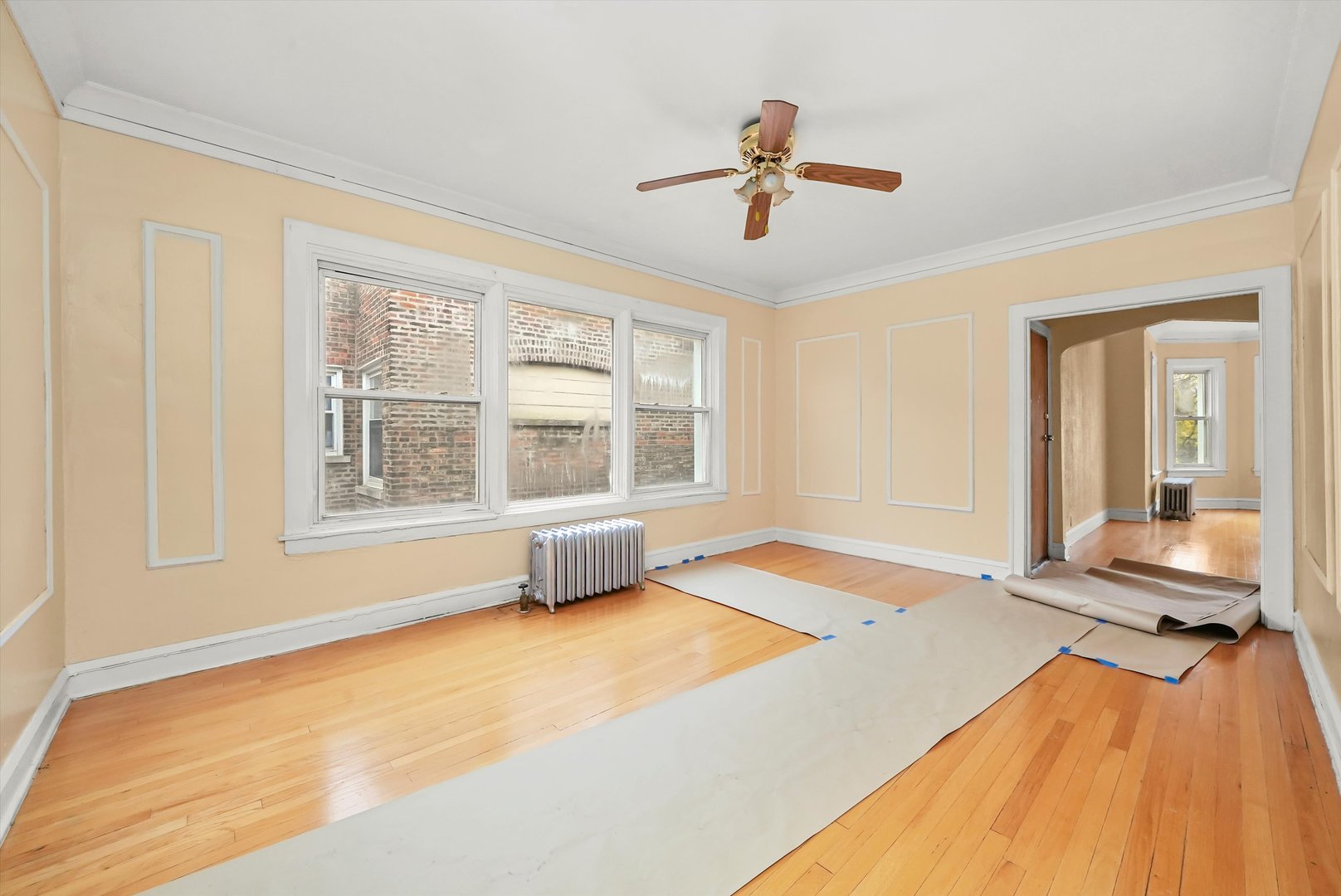 7825 South Phillips Avenue Chicago, IL 60649 - Photo 44 of 55 a bedroom with a bed and a large window with outer view