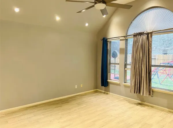 an empty room with windows