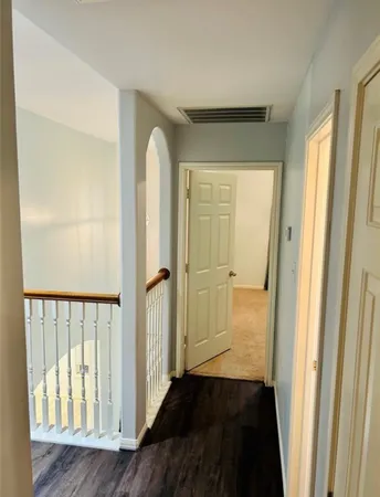 a view of a bathroom from the hallway