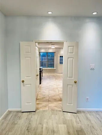 wooden floor in a hall with an entryway