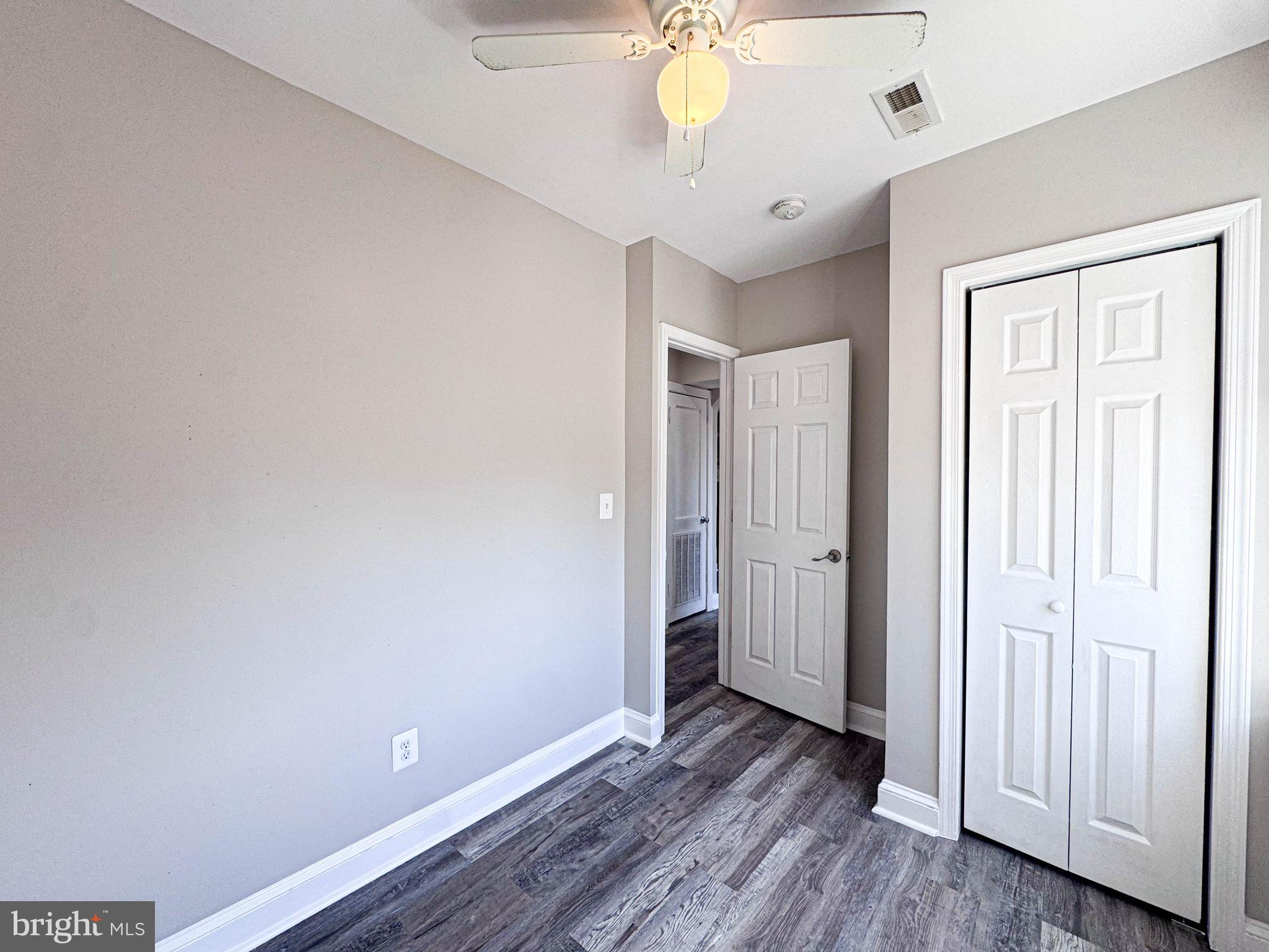 4630 Hillside Road Southeast, Unit 3 & 4 Washington, DC 20019 - Photo 16 of 23 a view of an empty room with wooden floor