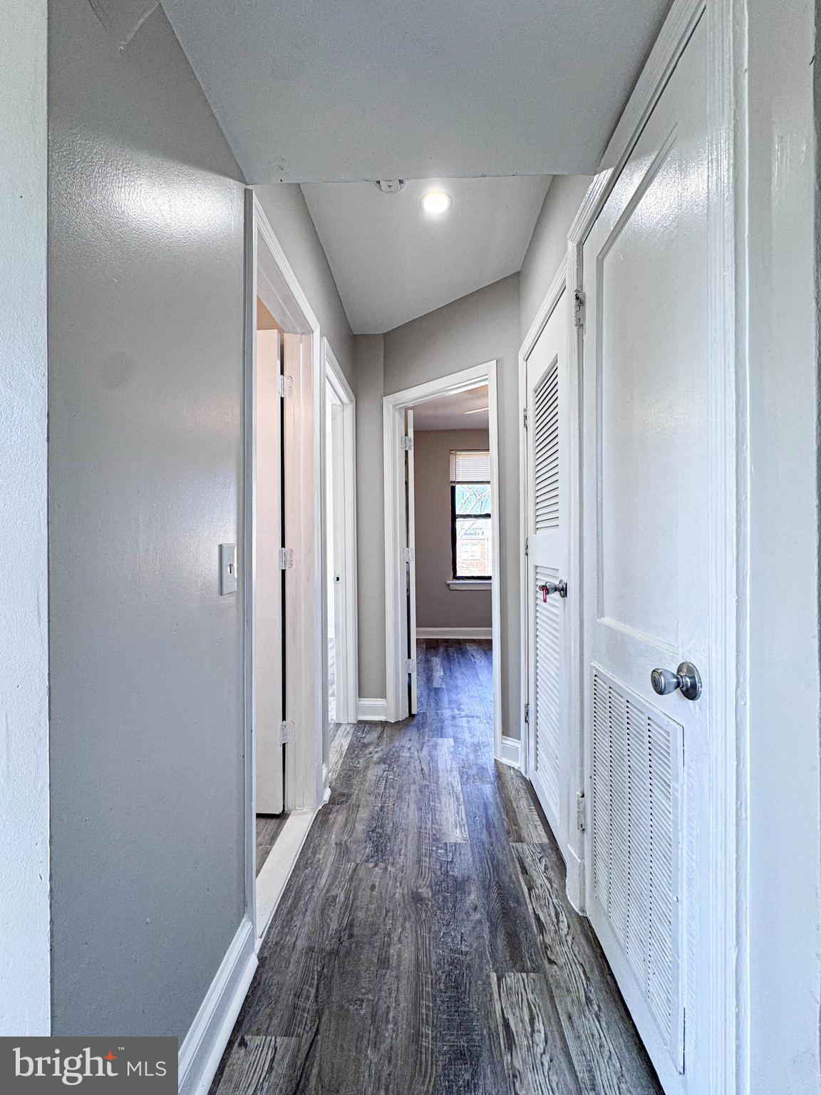 4630 Hillside Road Southeast, Unit 3 & 4 Washington, DC 20019 - Photo 23 of 23 a view of a hallway with wooden floor
