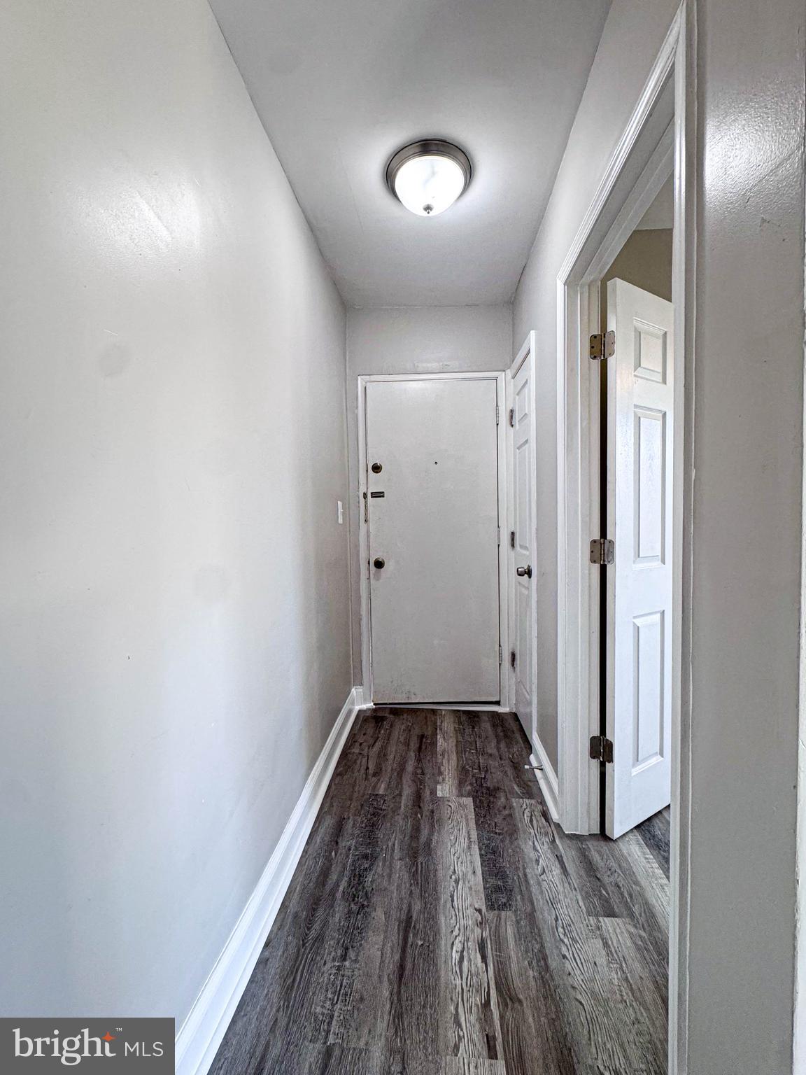 4630 Hillside Road Southeast, Unit 3 & 4 Washington, DC 20019 - Photo 10 of 23 a view of a hallway with wooden floor