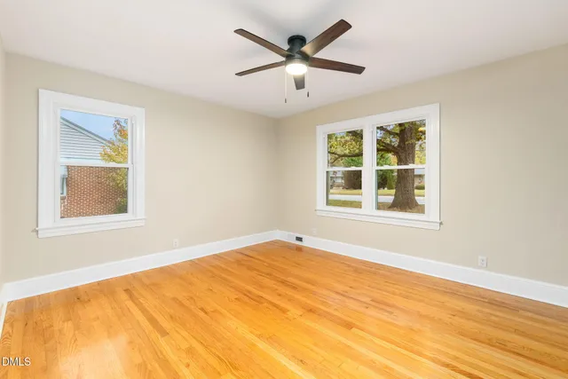 a view of cabinets a sink and a window