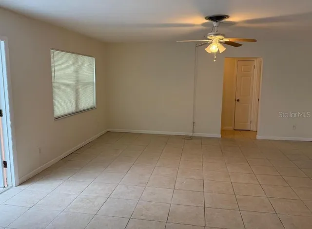 a bathroom with a double vanity sink toilet and shower