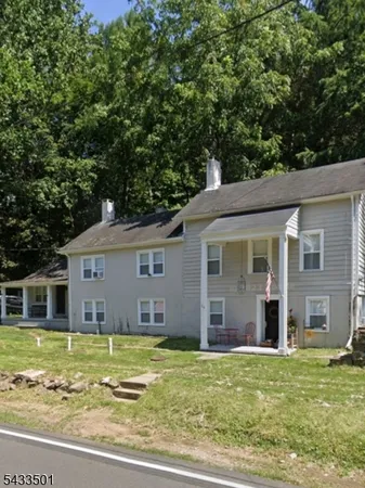 a view of a house with a swimming pool
