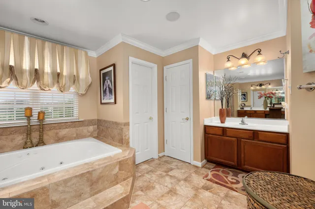 a bathroom with a bathtub and a sink