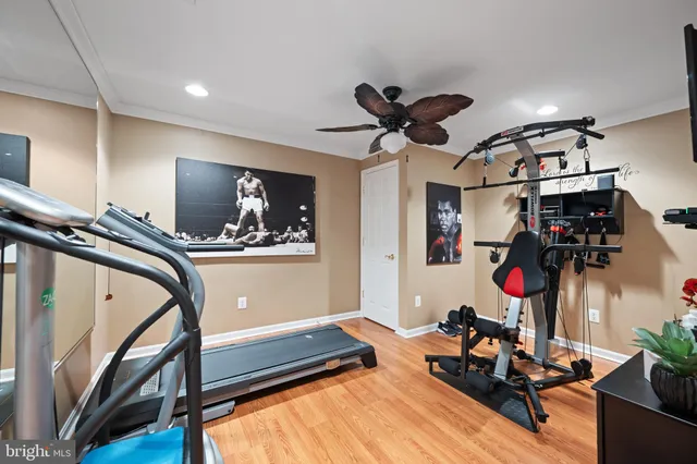 a room with lots of gym equipment