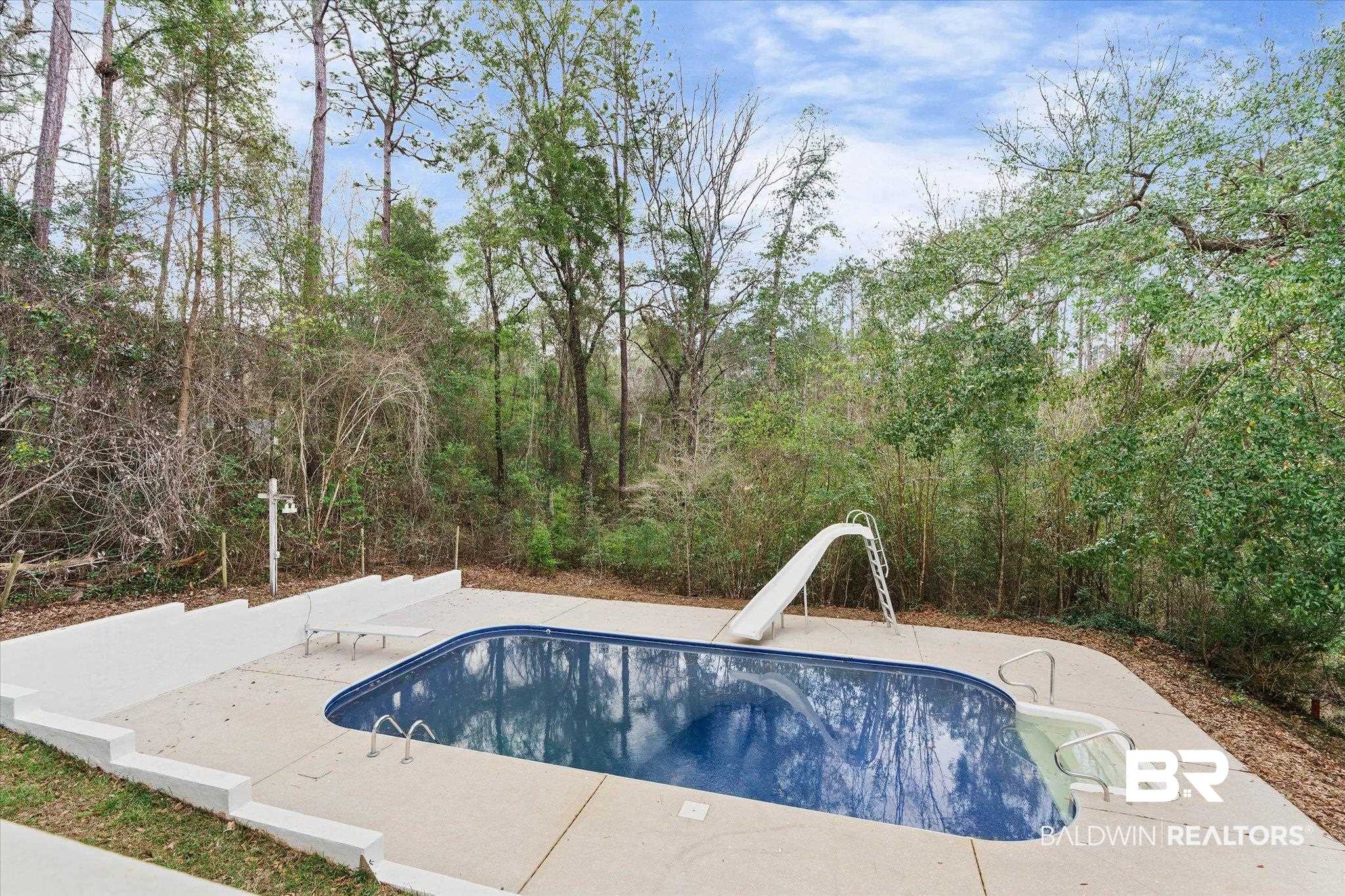 106 Melanie Loop Daphne, AL 36526 - Photo 32 of 45 Swimming pool featuring a patio, a water slide, and a diving board
