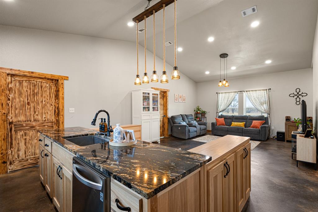 1501 Huddleston Road Sunset, TX 76270 - Photo 7 of 17 a kitchen with sink stove and cabinets