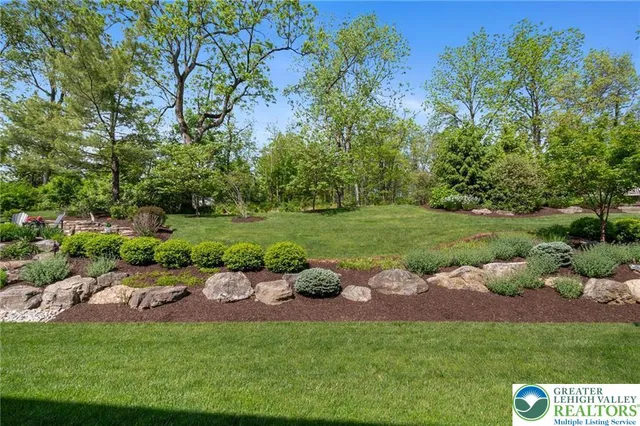 a view of a backyard with garden