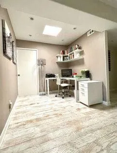 a view of a kitchen with furniture and a kitchen