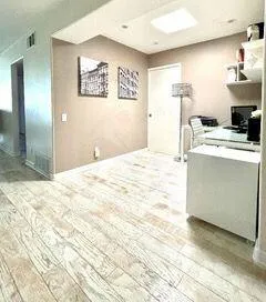 a view of a kitchen with a sink