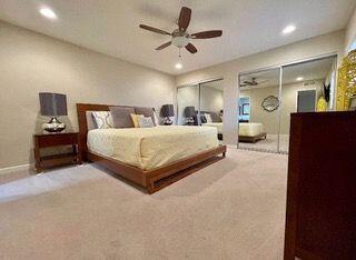 26 Sunrise Drive Rancho Mirage, CA 92270 - Photo 9 of 39 a bedroom with a large bed and window