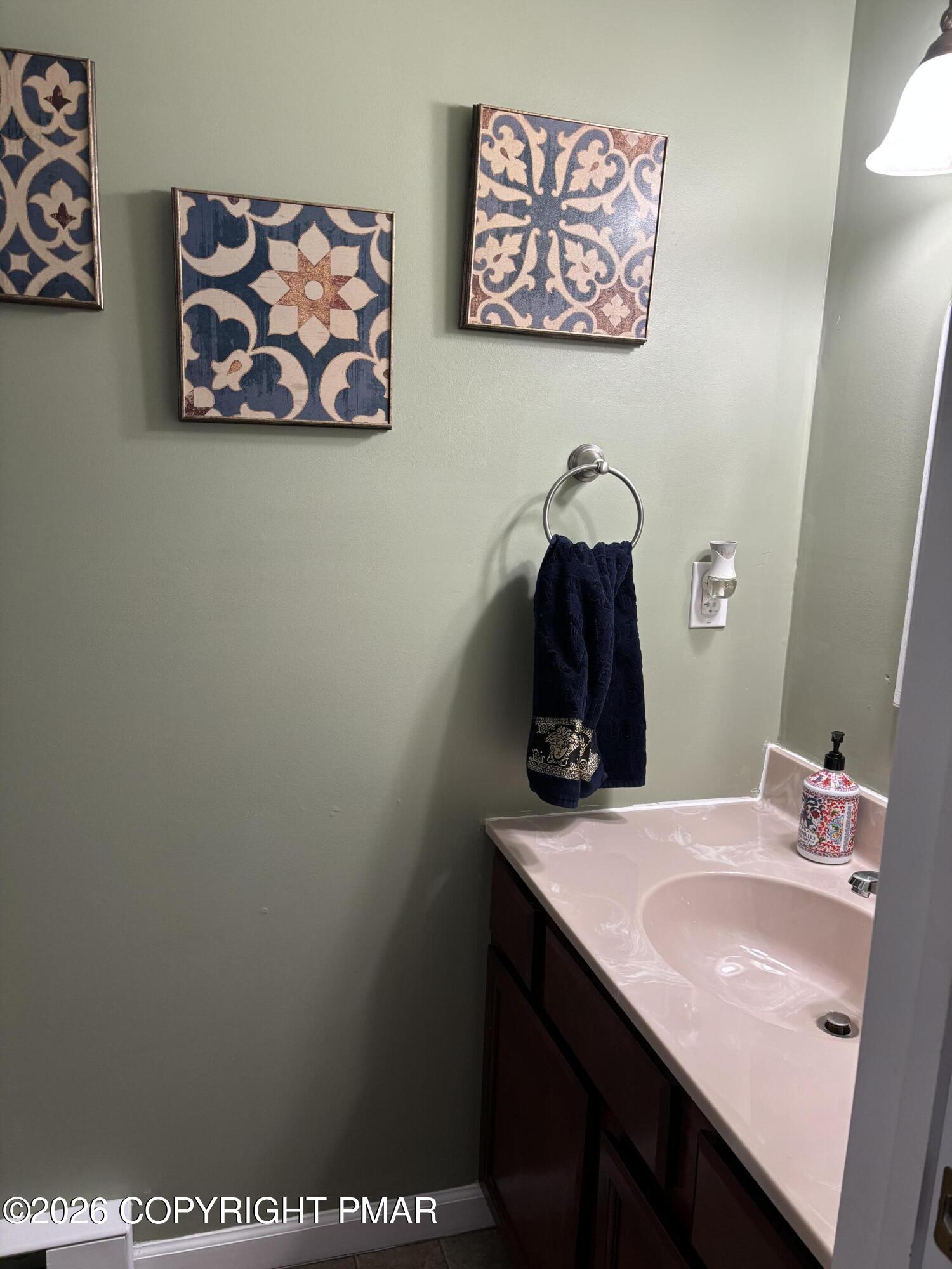 3222 Beech Ridge Drive Pocono Summit, PA 18346 - Photo 8 of 20 a bathroom with a sink and a mirror