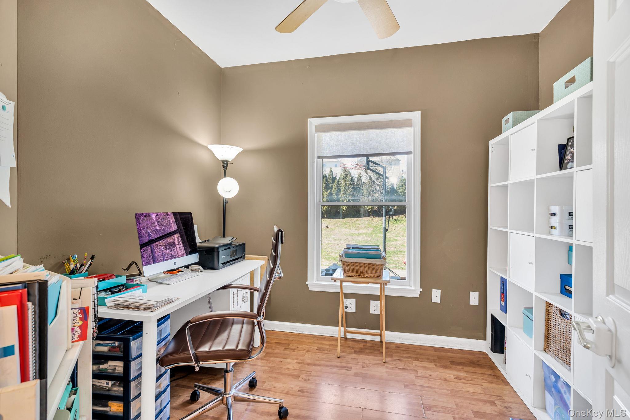 27 Overlook Road White Plains, NY 10605 - Photo 13 of 28 a view of a workspace with furniture and a window
