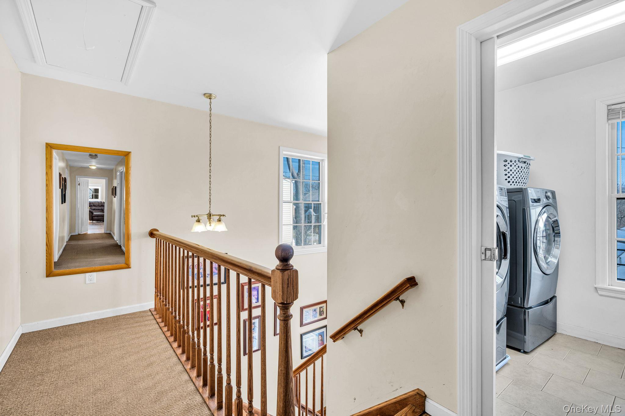 27 Overlook Road White Plains, NY 10605 - Photo 20 of 28 a view of a hallway with windows and stairs