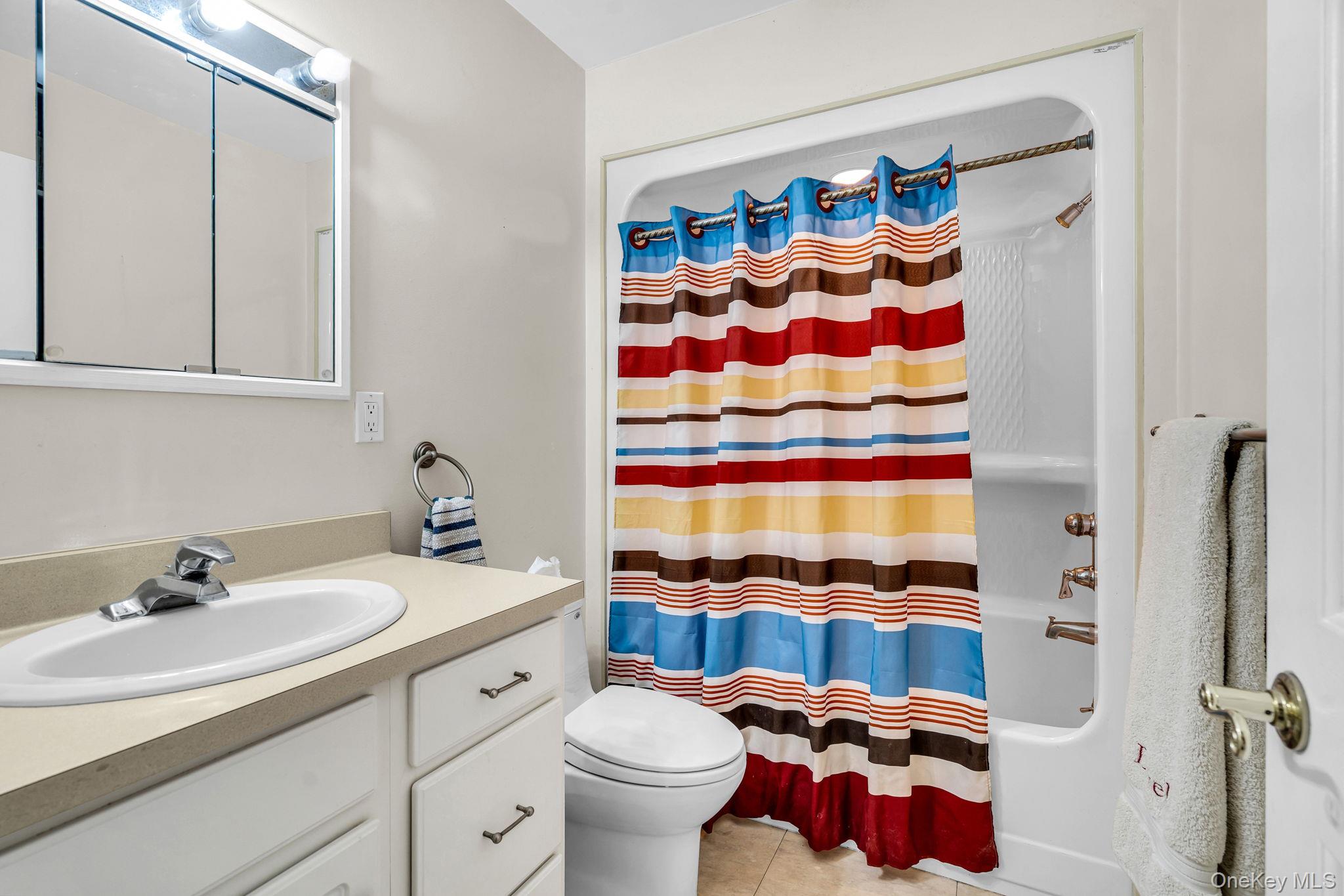 27 Overlook Road White Plains, NY 10605 - Photo 21 of 28 a bathroom with a sink and a curtain