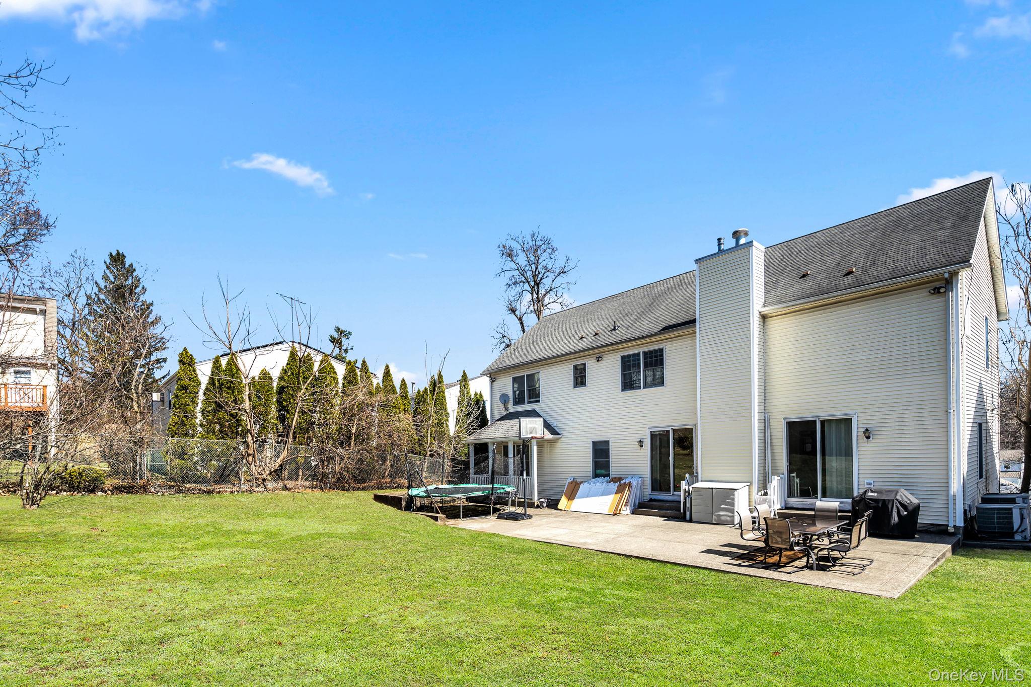 27 Overlook Road White Plains, NY 10605 - Photo 25 of 28 a view of a house with backyard porch and sitting area