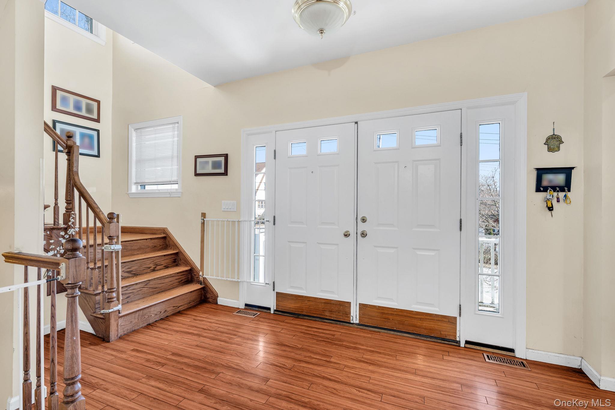 27 Overlook Road White Plains, NY 10605 - Photo 4 of 28 a view of a livingroom with wooden floor and stairs