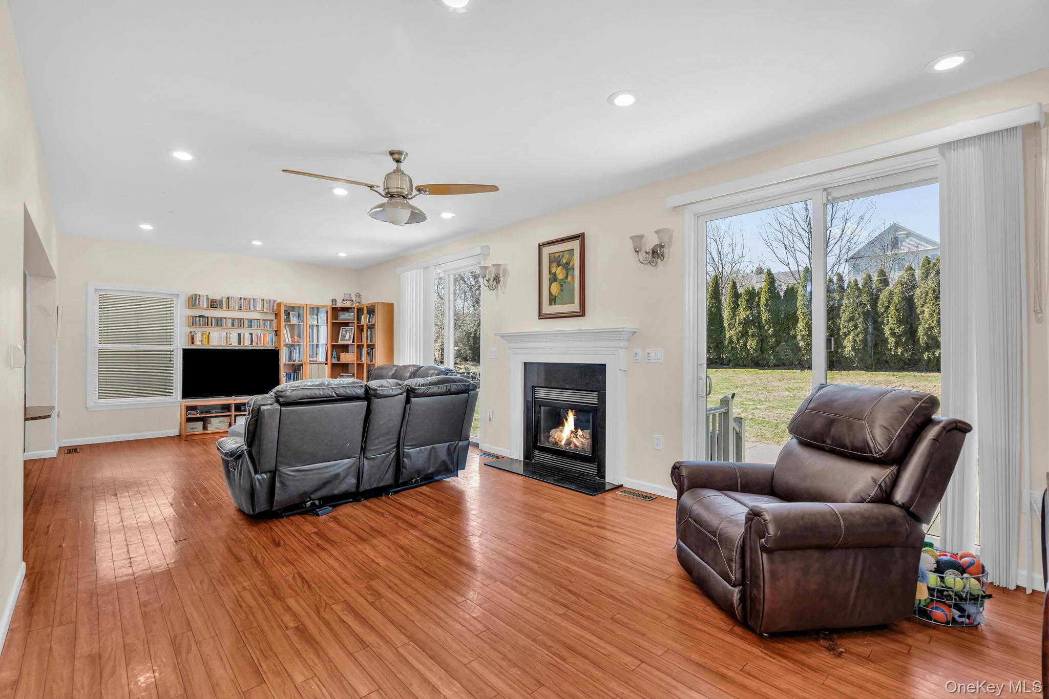 27 Overlook Road White Plains, NY 10605 - Photo 8 of 28 a living room with furniture and a fireplace