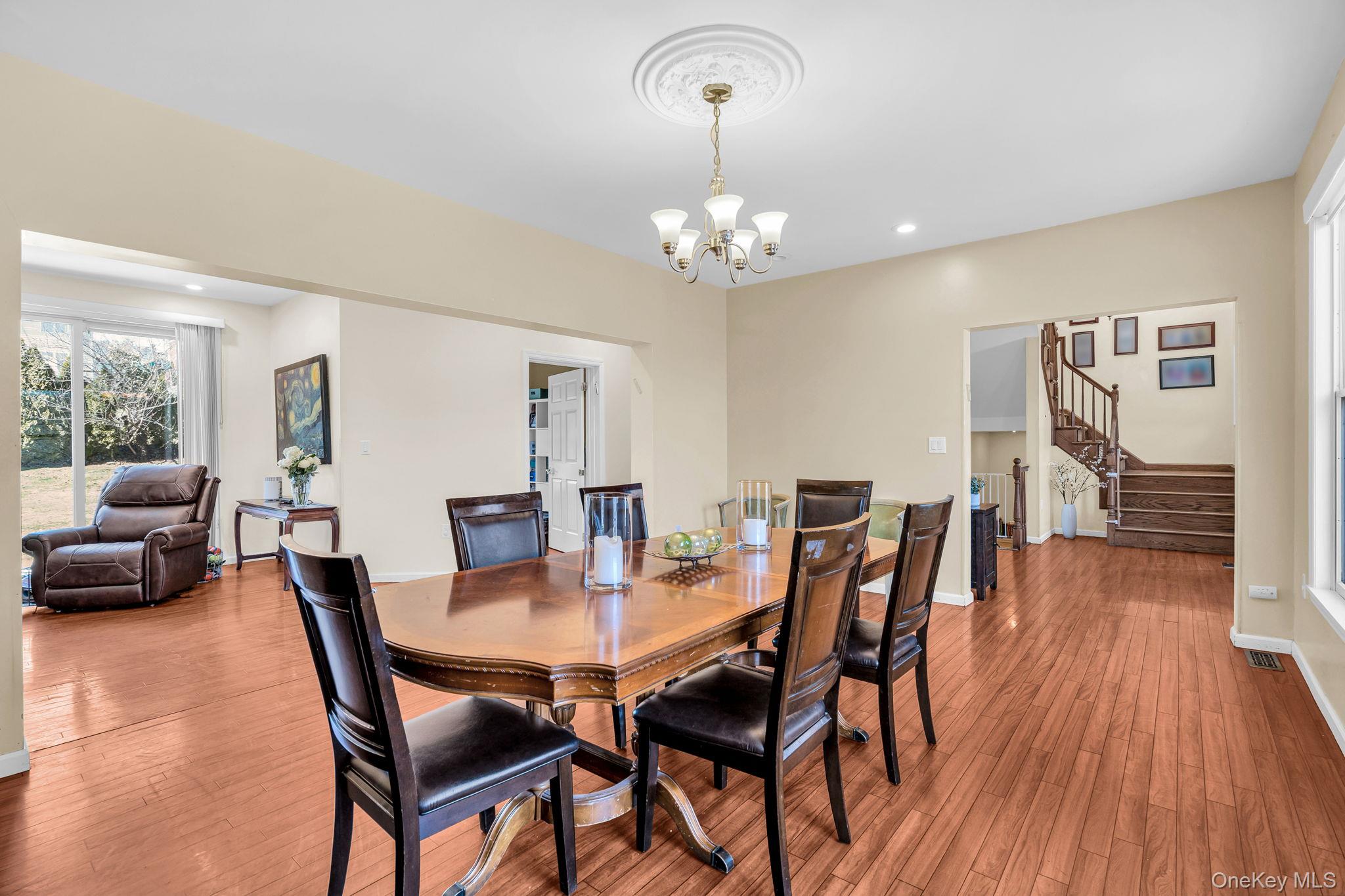 27 Overlook Road White Plains, NY 10605 - Photo 10 of 28 a view of a dining room with furniture and wooden floor
