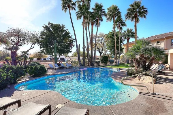 a kitchen with cabinets and window