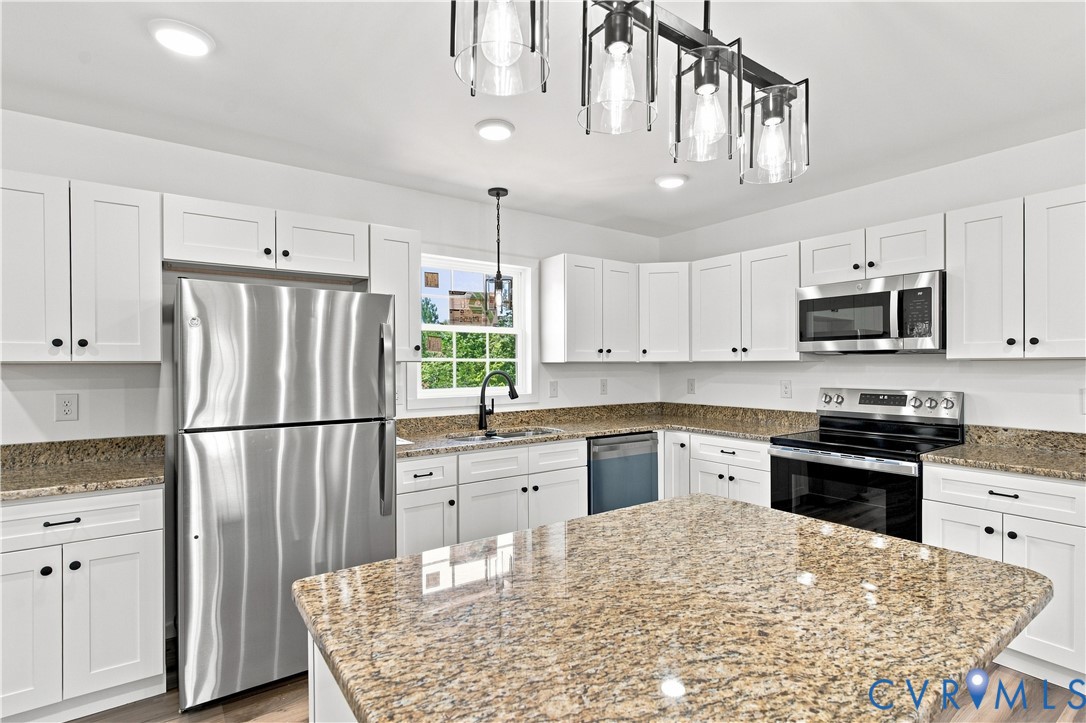 104 Abrams Road Farmville, VA 23901 - Photo 5 of 25 Kitchen featuring white cabinetry, stainless steel