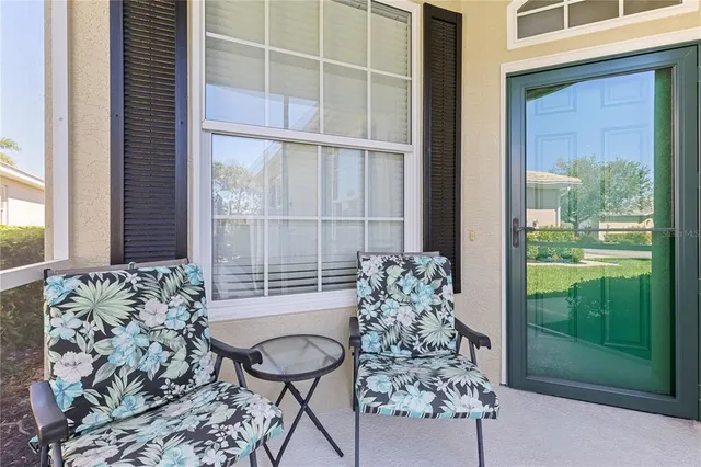 a view of a balcony and chair