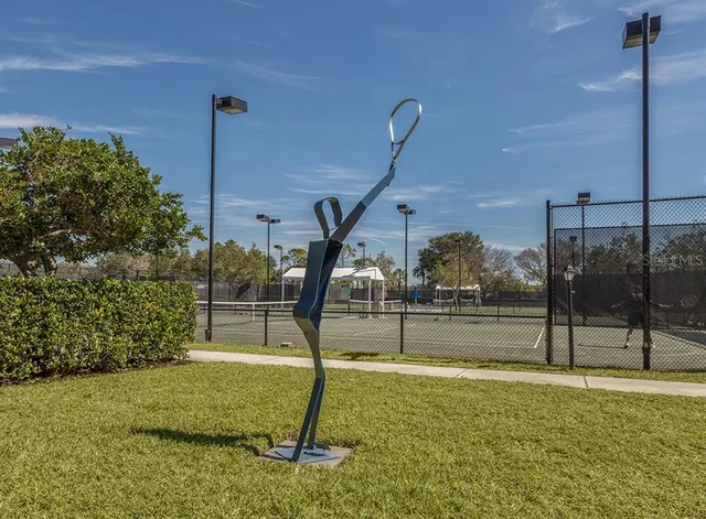 a view of a golf course with a lake