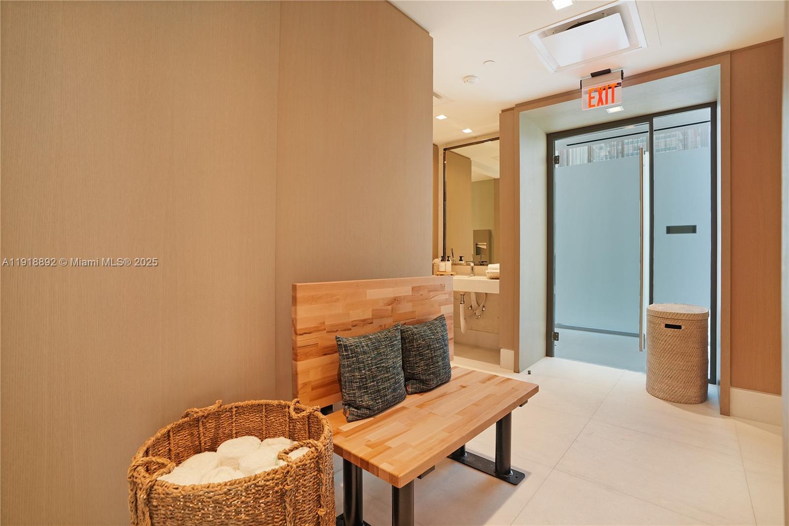 700 Northeast 26th Terrace, Unit 3604 Miami, FL 33137 - Photo 28 of 35 a bathroom with a sink a toilet and mirror