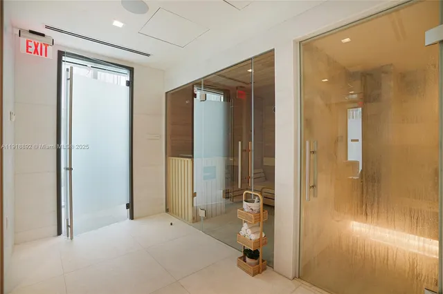 a room with furniture and ceiling fan