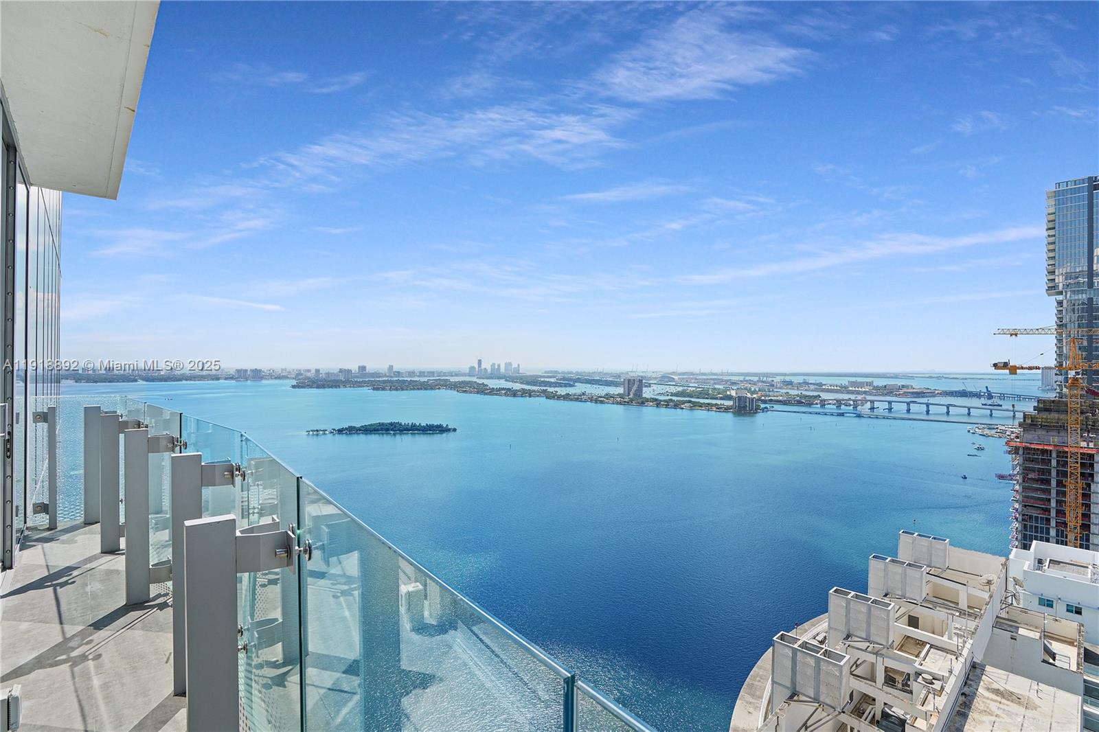 700 Northeast 26th Terrace, Unit 3604 Miami, FL 33137 - Photo 5 of 35 a view of a balcony with an ocean view
