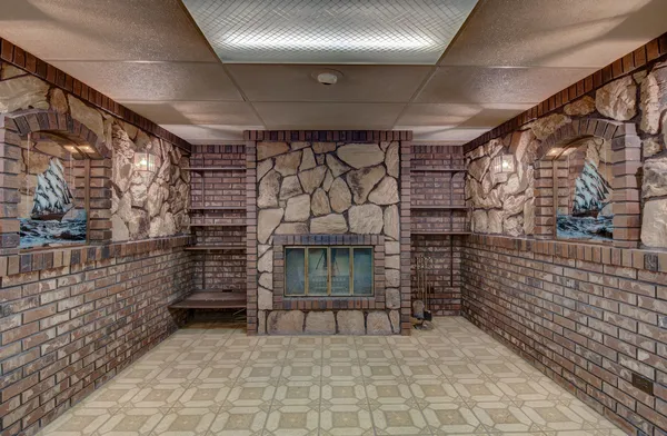 a bathroom with a toilet a sink and the shower