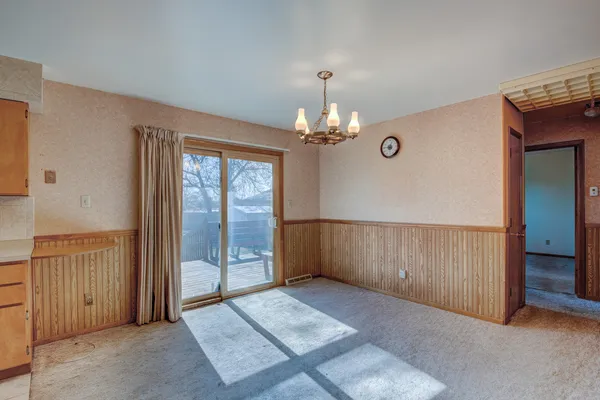 a kitchen with sink and cabinets