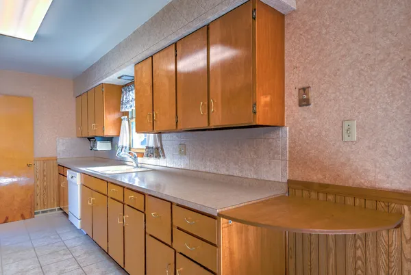 a bathroom with a sink a toilet and a bathtub