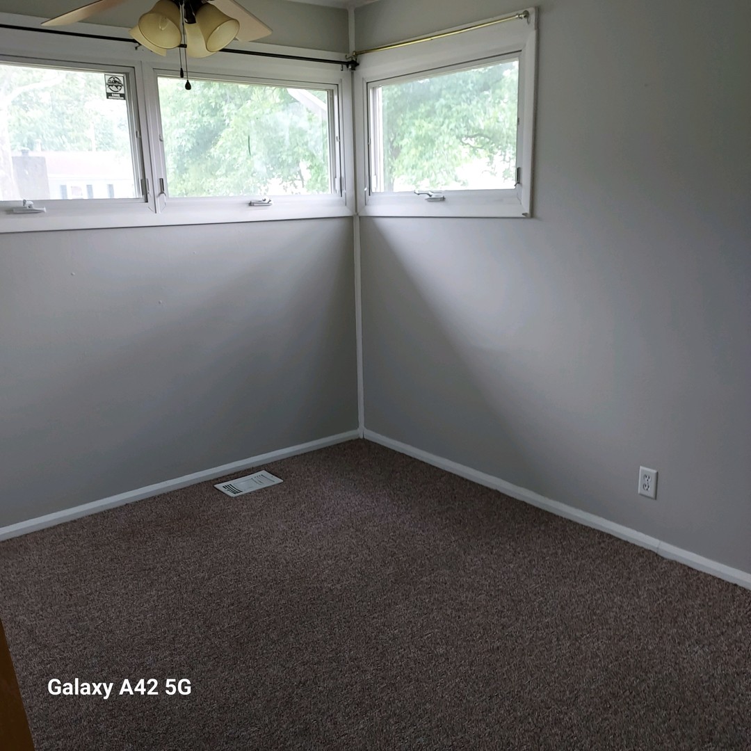 508 East North Line Road Tuscola, IL 61953 - Photo 11 of 12 an empty room with a window
