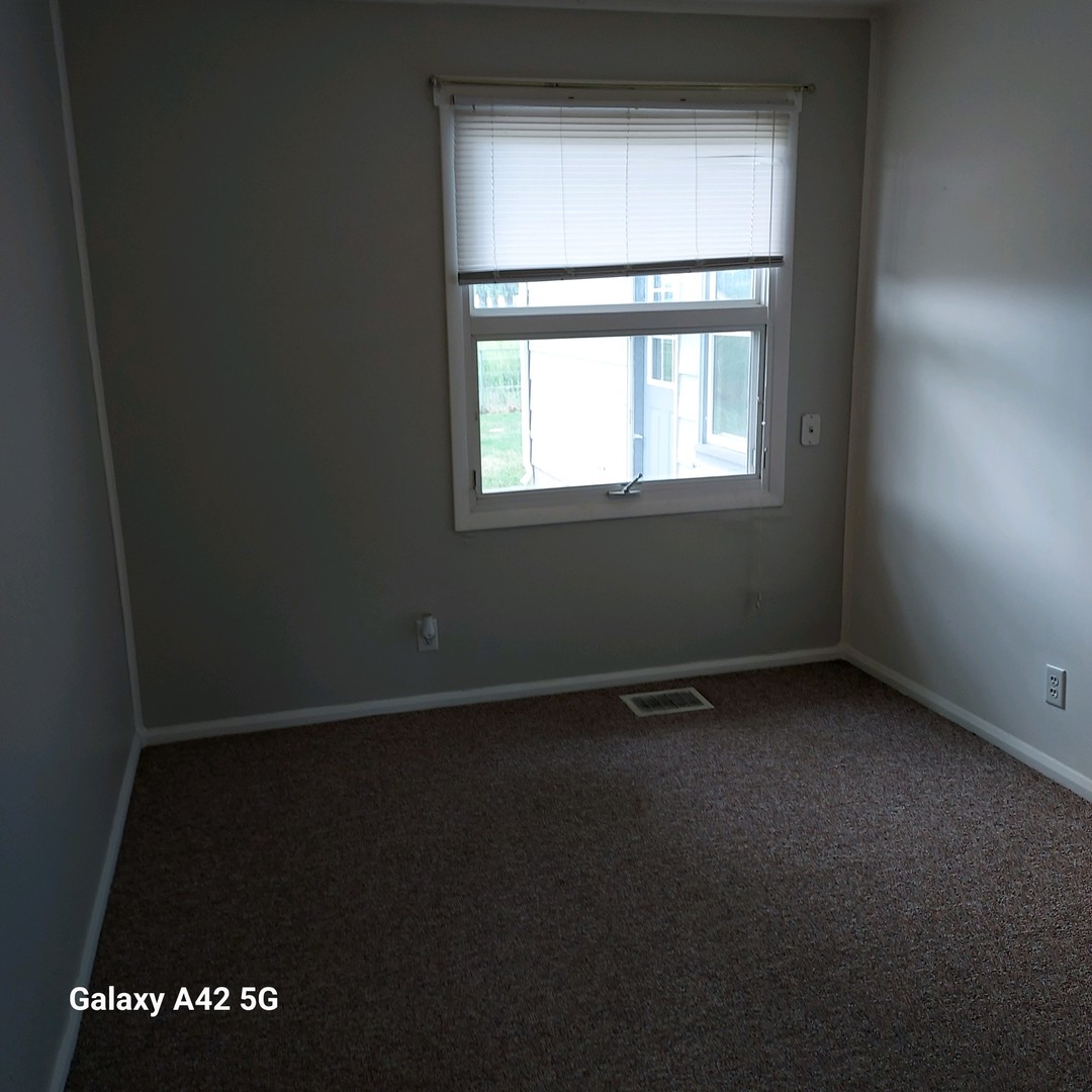 508 East North Line Road Tuscola, IL 61953 - Photo 12 of 12 a view of an empty room with a window