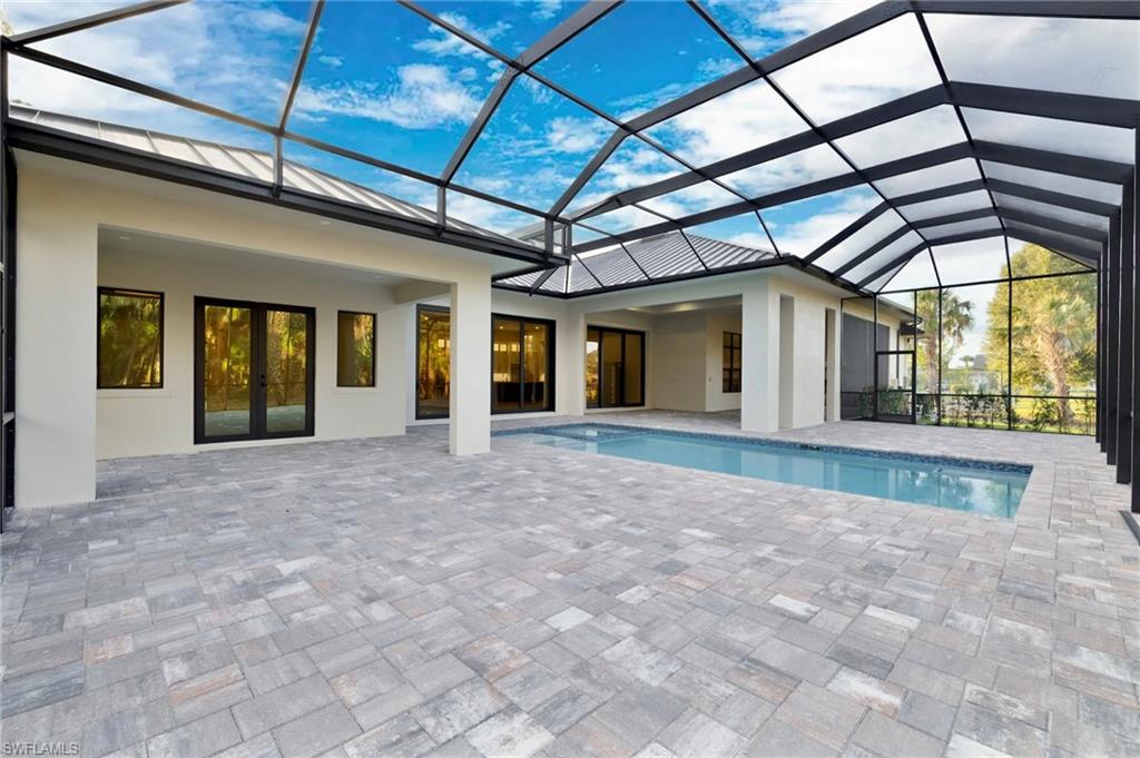 538 13th Street Southwest Naples, FL 34117 - Photo 12 of 15 a view of a building with a porch