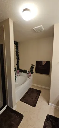 a bathroom with a sink and a shower