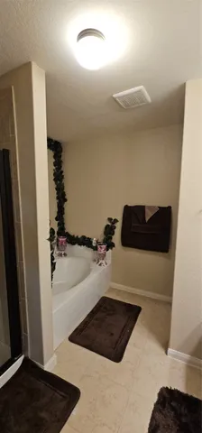 a bathroom with a sink and a shower