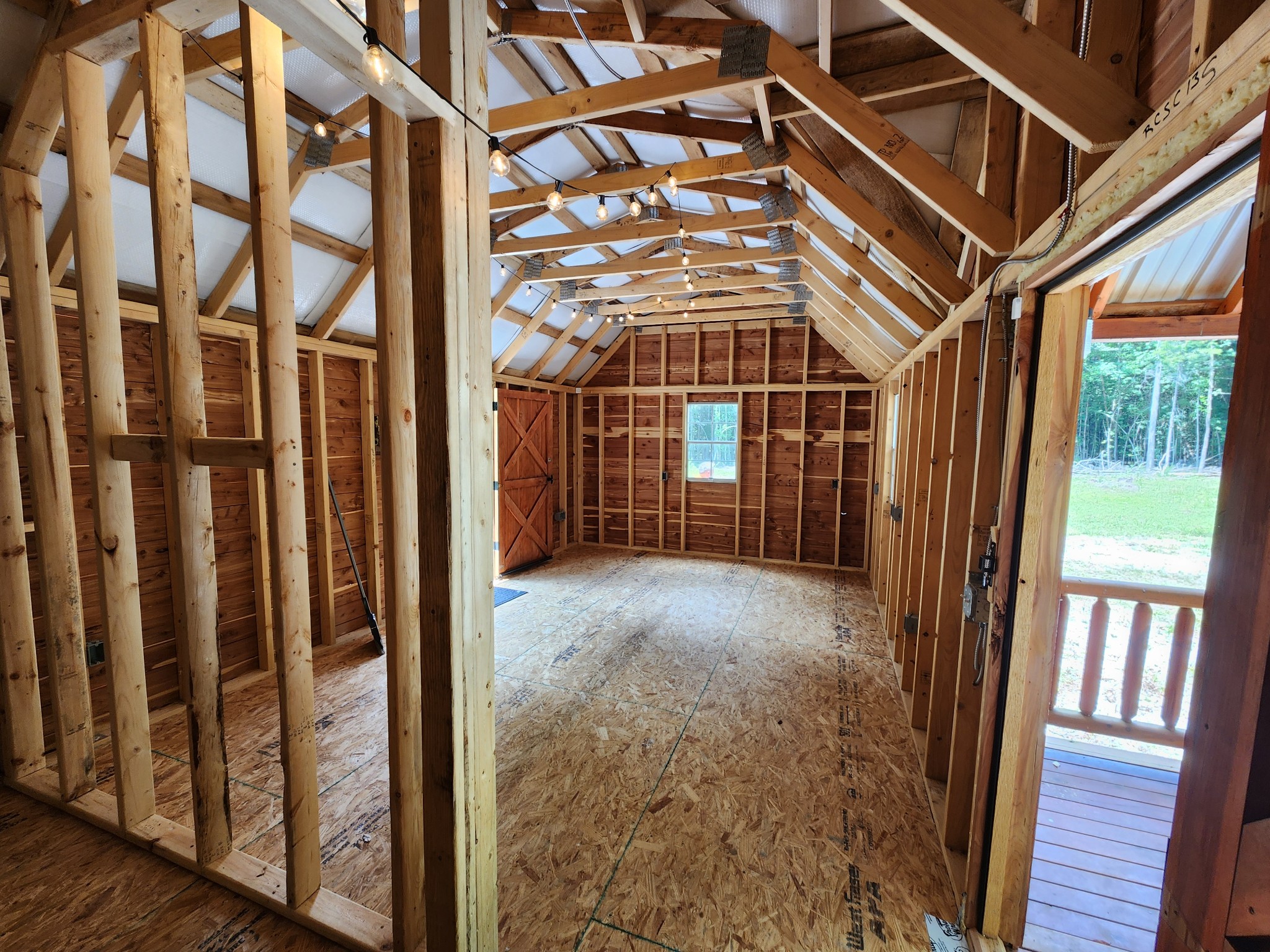 433 Sid Summers Road Stewart, TN 37175 - Photo 23 of 66 a view of a porch with wooden floor and fence