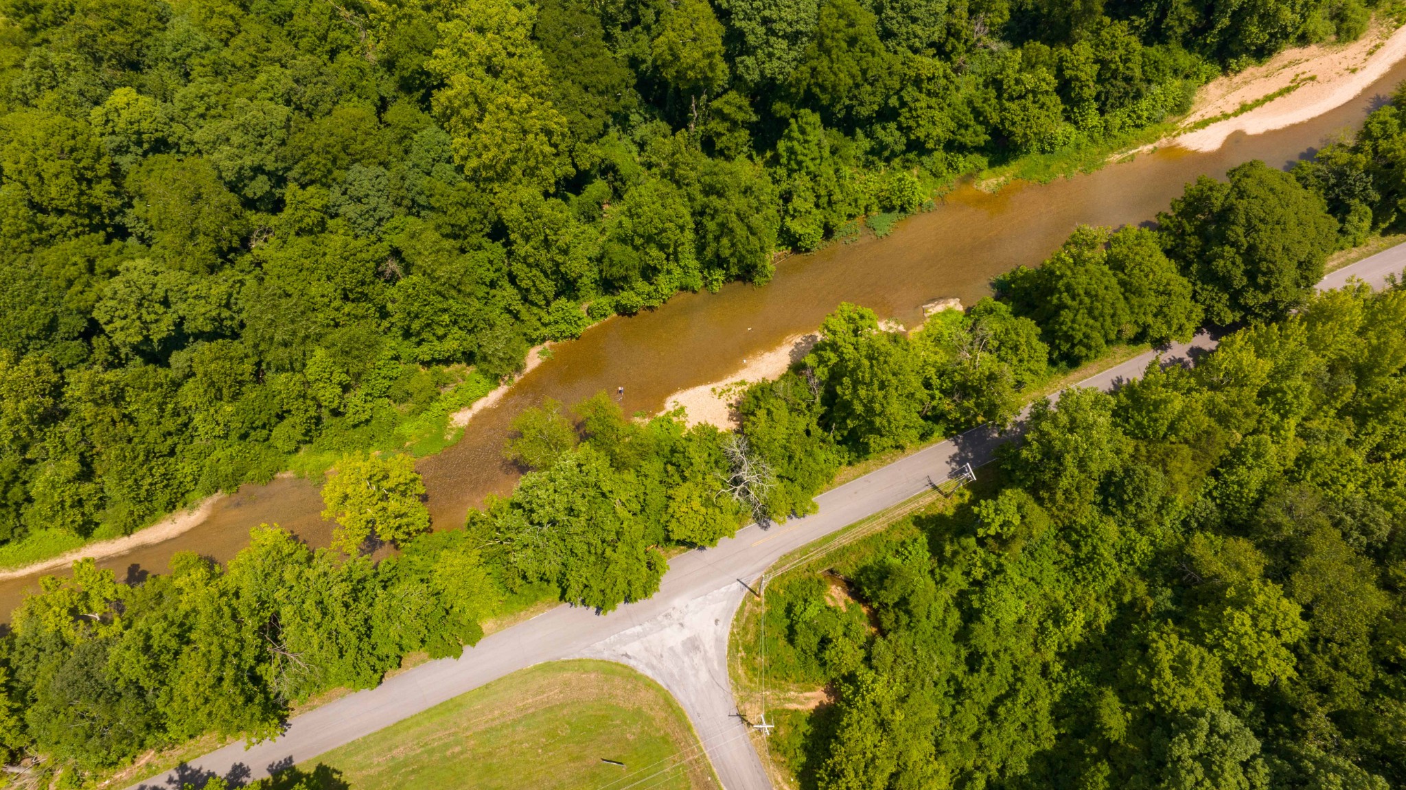 433 Sid Summers Road Stewart, TN 37175 - Photo 35 of 66 a view of a lake with a yard